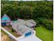 Aerial view showcasing home, pool, and detached garage at 12270 Virginia Dr, Leesburg, FL 34788