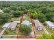 Aerial view showing property lot and surroundings at 704 N Disston Ave, Tavares, FL 32778