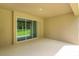 Covered patio with sliding glass doors at 2368 Juniper Berry Dr, Minneola, FL 34715