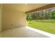 Covered patio overlooking backyard at 2368 Juniper Berry Dr, Minneola, FL 34715