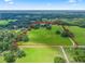 Large lot with open pasture and mature trees at 2027 Cr 232, Wildwood, FL 34785