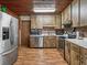 Kitchen with stainless steel appliances and wood cabinets at 2027 Cr 232, Wildwood, FL 34785