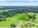 Aerial view of a large lot near a cemetery at 2027 Cr 232, Wildwood, FL 34785
