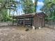 Wooden barn providing shelter for goats at 2027 Cr 232, Wildwood, FL 34785