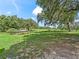 Large backyard with above ground pool and open space at 2027 Cr 232, Wildwood, FL 34785