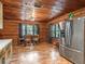 Rustic kitchen with stainless steel appliances and wood cabinets at 2027 Cr 232, Wildwood, FL 34785