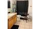 Clean bathroom featuring a bathtub, toilet, and vanity with storage at 1603 Rose Ln, Eustis, FL 32726