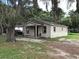 Single story home with covered porch at 1603 Rose Ln, Eustis, FL 32726