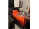 Cozy bedroom with a full-size bed and nightstand at 1603 Rose Ln, Eustis, FL 32726