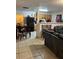 Kitchen with wood cabinets and appliances at 1603 Rose Ln, Eustis, FL 32726