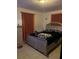 Bright bedroom with a double bed and ample closet space at 1603 Rose Ln, Eustis, FL 32726