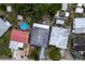 Aerial view showing home, yard, and neighborhood at 1113 Oakland Cir, Tavares, FL 32778