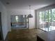 Spacious dining room with hardwood floors and view of living room at 415 Se 123Rd Street Rd, Ocala, FL 34480