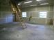 Unfinished workshop with attic access and ladder at 415 Se 123Rd Street Rd, Ocala, FL 34480