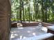 Brick patio with fountain, offering a serene outdoor space at 415 Se 123Rd Street Rd, Ocala, FL 34480