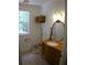 Vintage bathroom with antique vanity and fixtures at 415 Se 123Rd Street Rd, Ocala, FL 34480