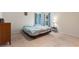 Main bedroom with carpeted floors and ensuite bathroom at 1163 Haines Dr, Winter Haven, FL 33881