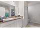 Clean bathroom with single sink vanity, shower, and toilet at 1163 Haines Dr, Winter Haven, FL 33881