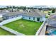 Aerial view of home's backyard with pool and fence at 1163 Haines Dr, Winter Haven, FL 33881