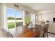 Bright dining area with sliding doors leading to backyard at 1163 Haines Dr, Winter Haven, FL 33881