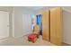 Bedroom with rocker, ottoman and large closet at 1163 Haines Dr, Winter Haven, FL 33881
