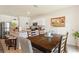 Kitchen boasts an island, granite countertops, and dining area at 1163 Haines Dr, Winter Haven, FL 33881