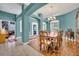 Spacious dining room with hardwood floors and chandelier at 3914 Scarborough Ct, Clermont, FL 34711