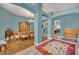 Formal dining room with wooden table and hardwood floors at 3914 Scarborough Ct, Clermont, FL 34711