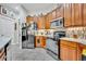Well-equipped kitchen with stainless steel appliances and ample counter space at 3914 Scarborough Ct, Clermont, FL 34711