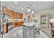 Modern kitchen with stainless steel appliances and a spacious island at 3914 Scarborough Ct, Clermont, FL 34711