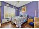 Guest bedroom with window and hardwood floors at 3914 Scarborough Ct, Clermont, FL 34711