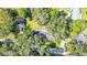 Property overview showing house and surroundings at 3230 Cr 421, Lake Panasoffkee, FL 33538