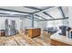 Kitchen with island, stainless steel fridge, and dining area at 3230 Cr 421, Lake Panasoffkee, FL 33538