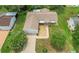 Single-story home with attached garage, driveway, and landscaped yard at 17548 Se 96Th Ave, Summerfield, FL 34491
