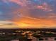 Stunning sunset over a serene marsh landscape at 13910 Max Hooks Rd, Clermont, FL 34711