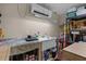 Workshop with sink, cabinetry, and storage shelving at 13910 Max Hooks Rd, Clermont, FL 34711