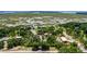 Aerial view of property showcasing land, buildings and lake at 13910 Max Hooks Rd, Clermont, FL 34711
