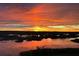 Stunning sunset over a tranquil marshland at 13910 Max Hooks Rd, Clermont, FL 34711