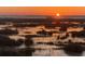 Sunrise over a misty marsh landscape at 13910 Max Hooks Rd, Clermont, FL 34711