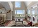 Spacious living room with large windows and view at 13910 Max Hooks Rd, Clermont, FL 34711