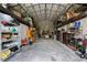 High-ceiling workshop with mezzanine storage and ample floor space at 13910 Max Hooks Rd, Clermont, FL 34711