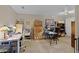 Home office with two desks, ample storage, and multiple workspaces at 13910 Max Hooks Rd, Clermont, FL 34711