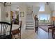 Elegant staircase leading to upper level at 13910 Max Hooks Rd, Clermont, FL 34711