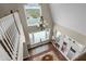 Spacious two-story foyer with hardwood floors and a chandelier at 13910 Max Hooks Rd, Clermont, FL 34711
