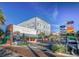 Street-level view of the property's location near various shops and restaurants in a vibrant downtown area at 601 N Mcdonald St # 608, Mount Dora, FL 32757