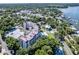 Aerial view of building, pool, and surroundings at 601 N Mcdonald St # 608, Mount Dora, FL 32757