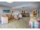 Common area with seating and a kitchenette at 601 N Mcdonald St # 608, Mount Dora, FL 32757