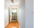 Light and airy entryway with wood flooring and access to screened porch at 601 N Mcdonald St # 608, Mount Dora, FL 32757