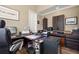 Large home office with a desk, computer, and ample storage at 8692 Crested Eagle Pl, Sanford, FL 32771
