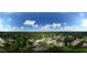Aerial view of a residential community with lush trees at 8692 Crested Eagle Pl, Sanford, FL 32771